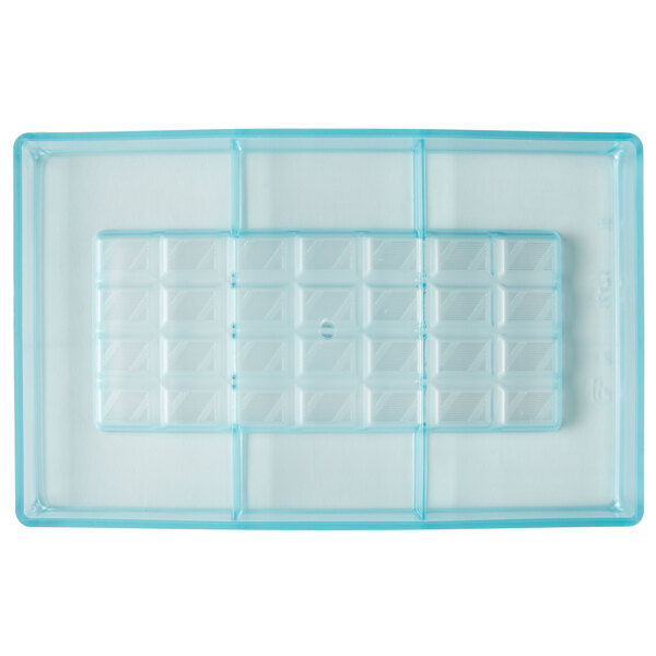 A clear plastic Matfer Bourgeat chocolate bar mold with four compartments.