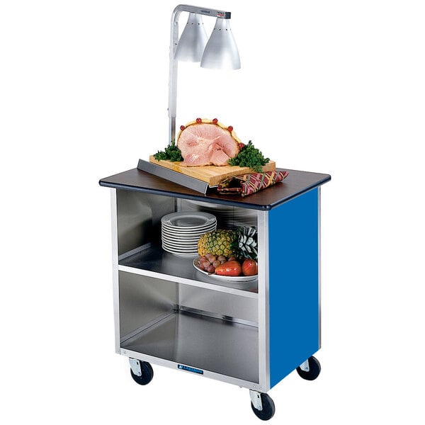 A Lakeside stainless steel utility cart with food on it.