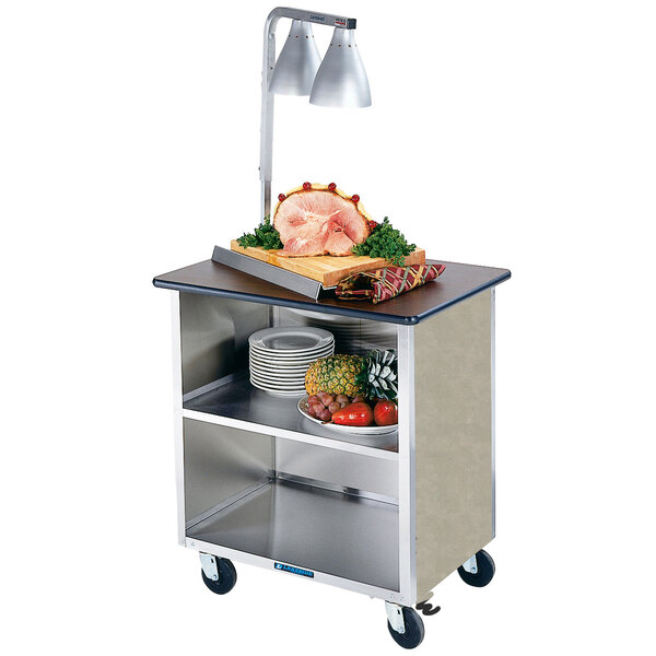 A Lakeside stainless steel utility cart with food on it.