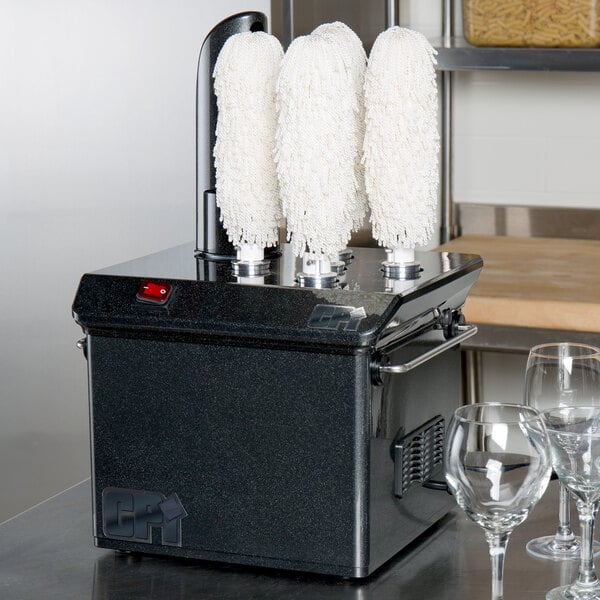 A black Campus Products StemshinePro glass polisher with white brushes on top.