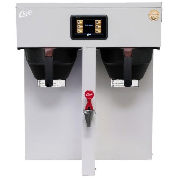 A white Curtis ThermoPro coffee brewer with black and brown containers.