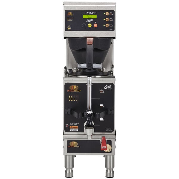 A close-up of a Curtis G3 Gemini IntelliFresh satellite coffee brewer with a black and silver finish and buttons and a screen.