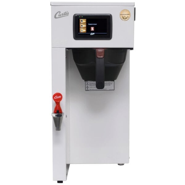 A white Curtis G4 ThermoPro coffee machine with a black screen.