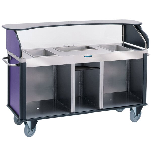 A silver Lakeside food cart with a purple countertop and three counter wells.
