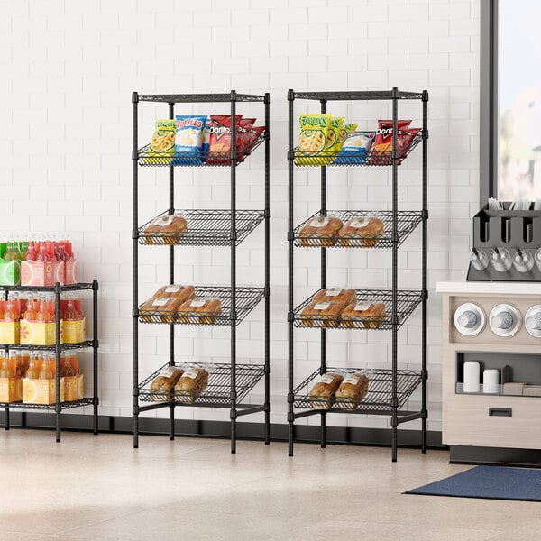 A Regency black wire shelving unit with food on the shelves.