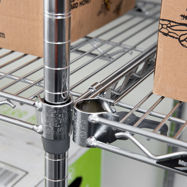 A Metro Super Erecta wire shelving unit with boxes on the shelves.