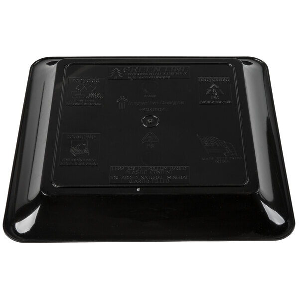 A black plastic square container with text on it.