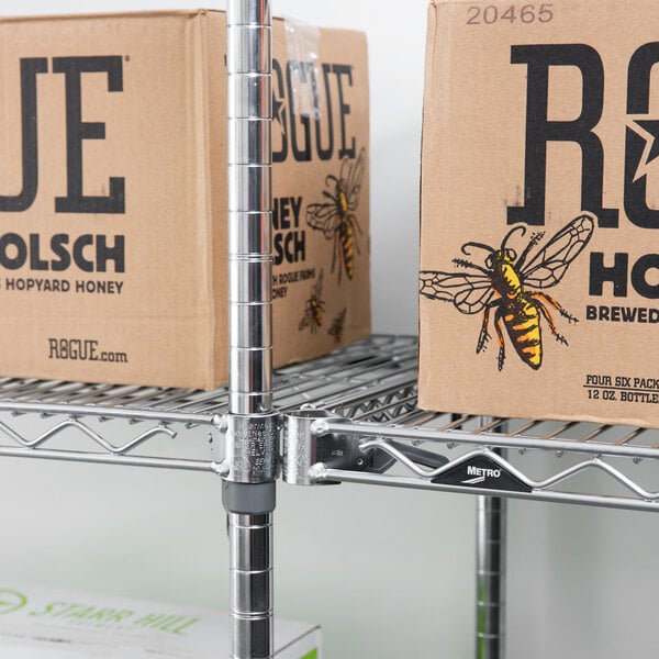 A Metro Super Erecta wire shelving unit with boxes on a shelf.