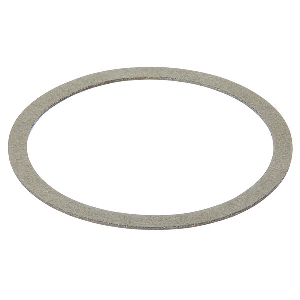 A round grey fiber gasket.