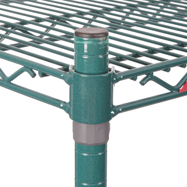 A Metroseal 3 wire stationary shelving unit with 4 shelves and metal poles.