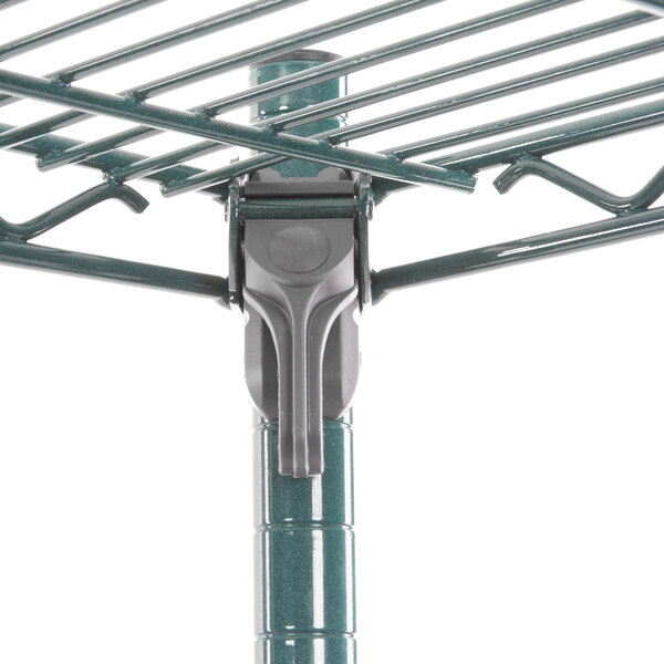 A Metroseal 3 wire shelving unit with 4 shelves on a pole.