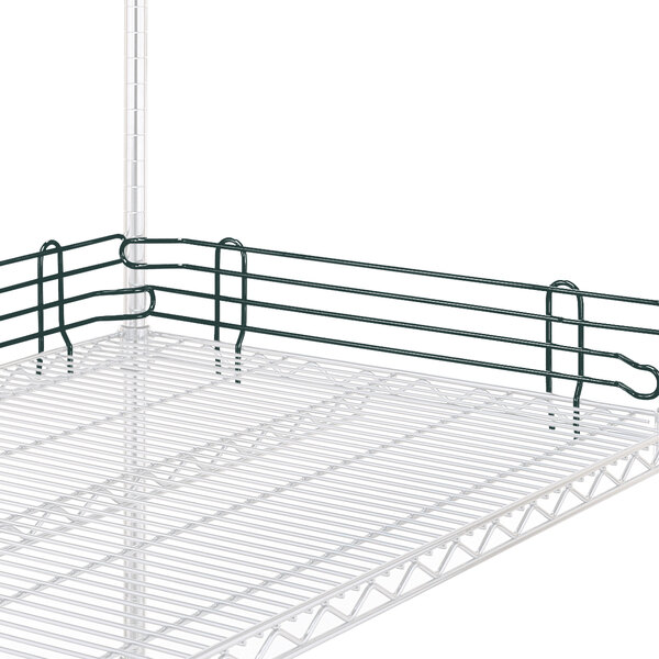 A Metro Super Erecta smoked glass ledge with green metal railing.