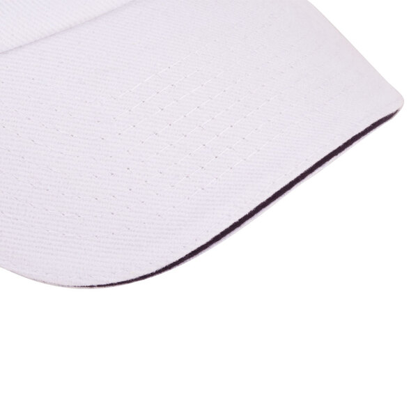 A white Chef Revival baseball cap with a black logo.