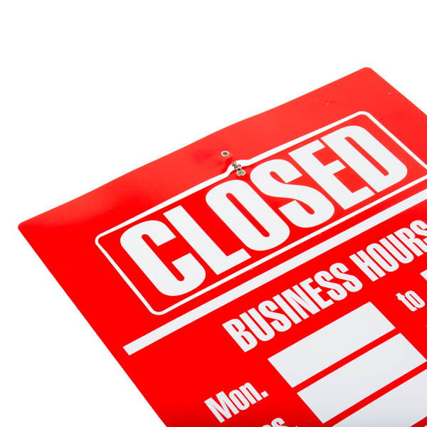 A red and white Cosco Business Hours sign.