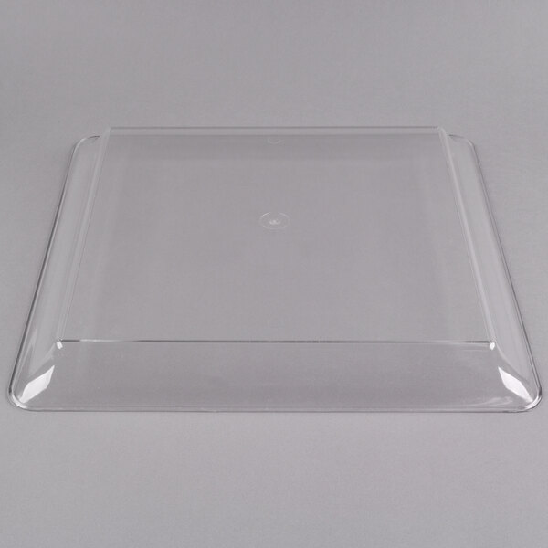 A clear plastic square Fineline Cater Tray with a circle in the middle.