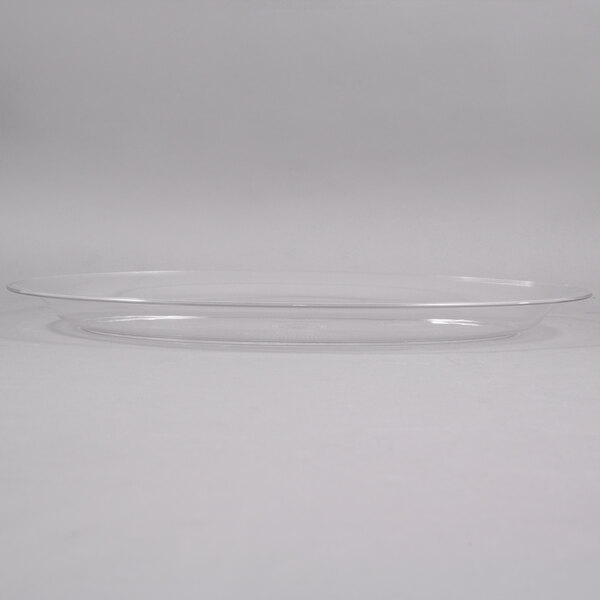 A clear plastic Fineline oval catering tray on a white surface.