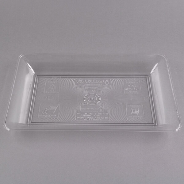 A clear plastic Fineline rectangular catering tray with a label on it.