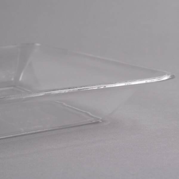 A Fineline clear plastic rectangular catering tray with a thin strip.