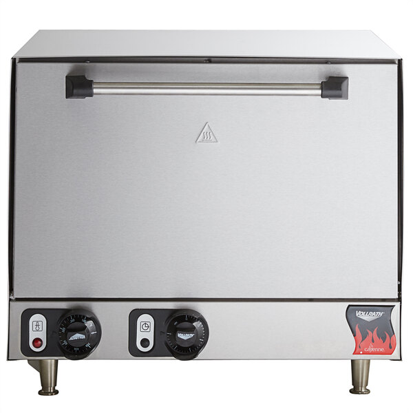 A Vollrath countertop electric pizza oven with two ceramic decks.