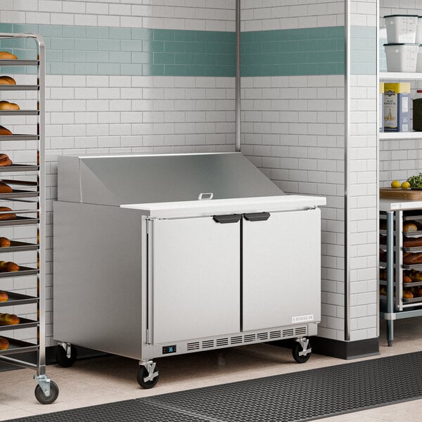 A Beverage-Air stainless steel commercial 2 door mega top refrigerator.