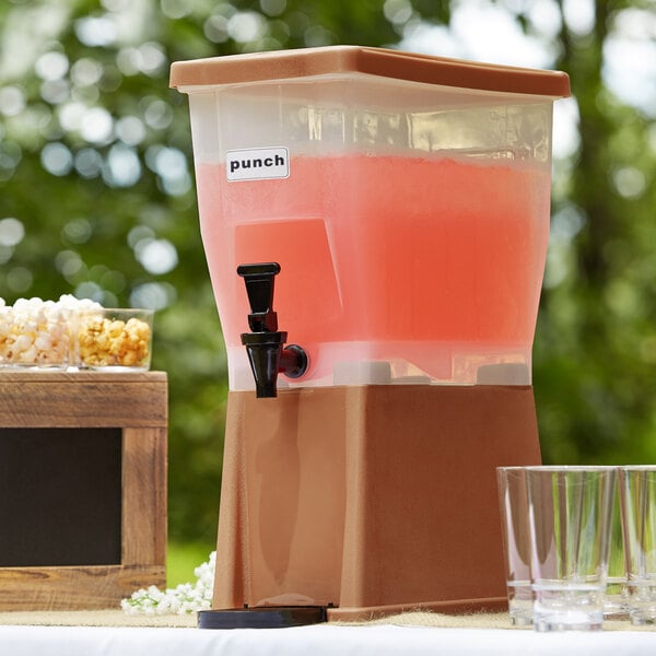 A brown plastic Choice beverage dispenser on a white background.