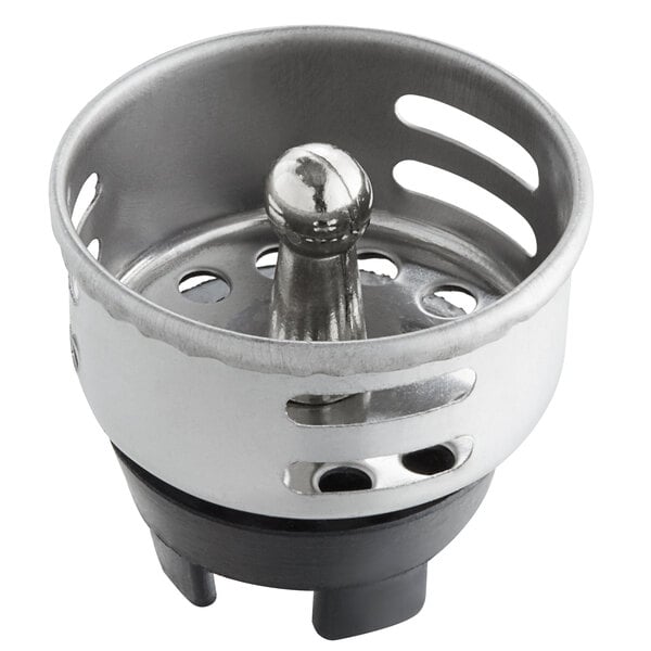 A stainless steel Regency basket strainer with black rubber stopper in a sink drain.