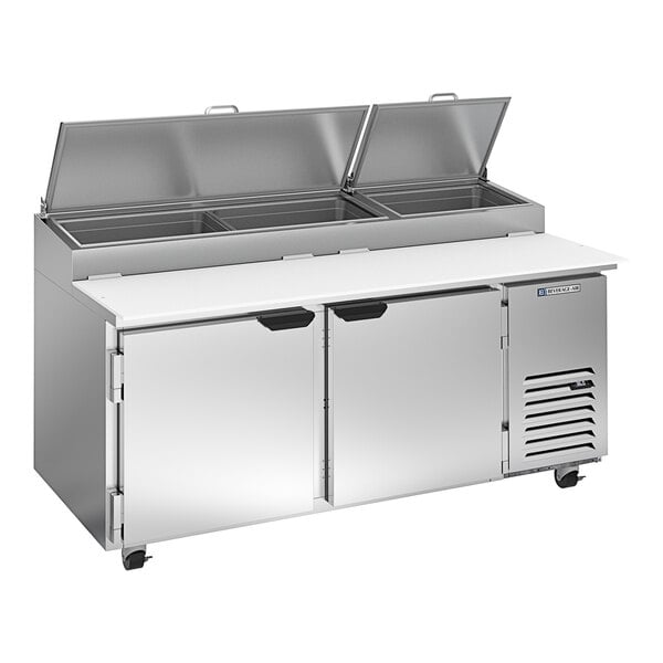 A Beverage-Air commercial pizza prep table with two doors on a counter.