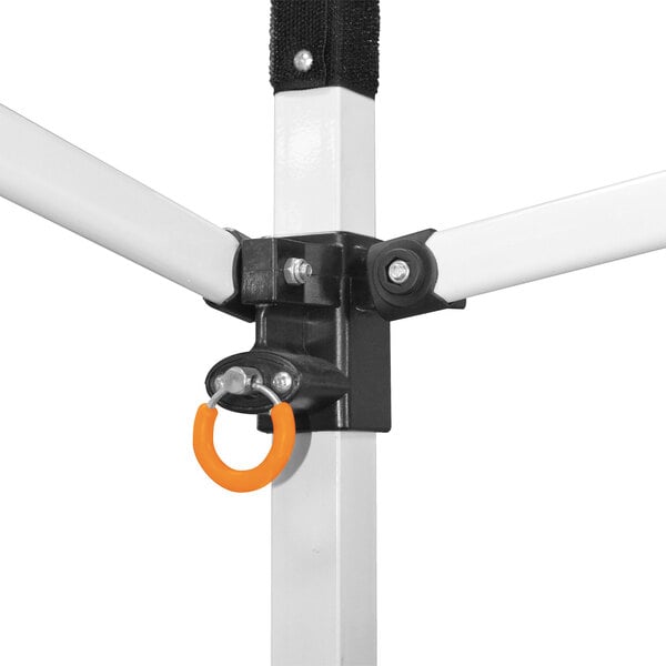 A metal pole with a round object attached to it with orange rings.