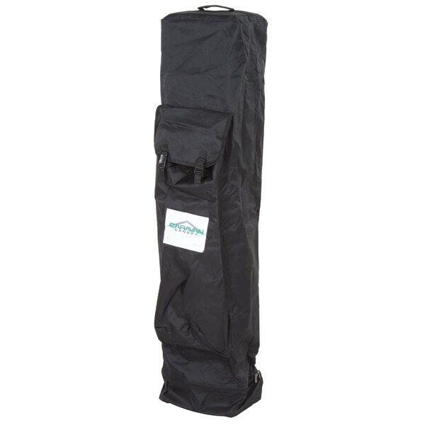 A black Caravan Canopy travel bag with a white label.