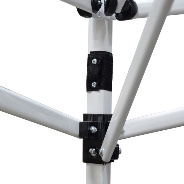 A close-up of the white metal frame of a Caravan Canopy V-Series 2.