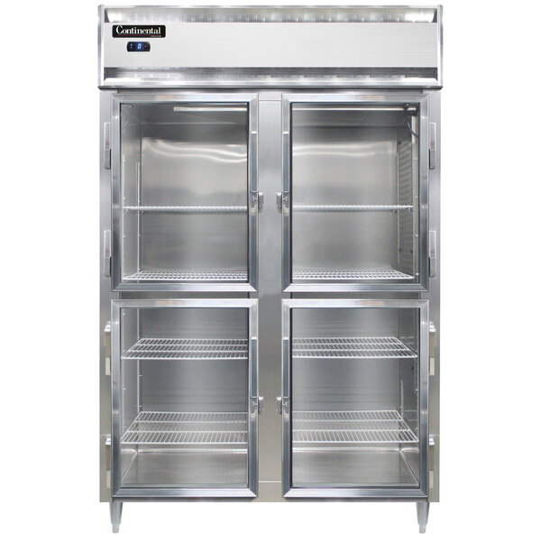 A Continental stainless steel reach-in freezer with double glass doors and shelves.