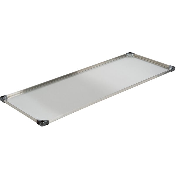 A close-up of a rectangular stainless steel Metro shelf.