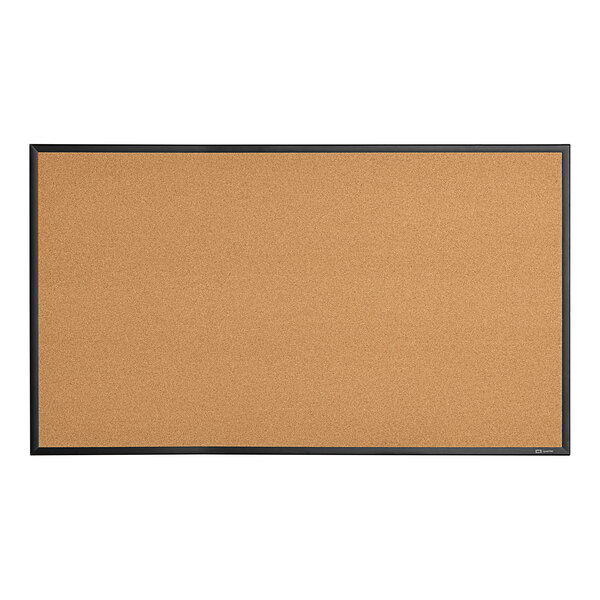 A close-up of a Quartet cork board with a black frame and black trim.