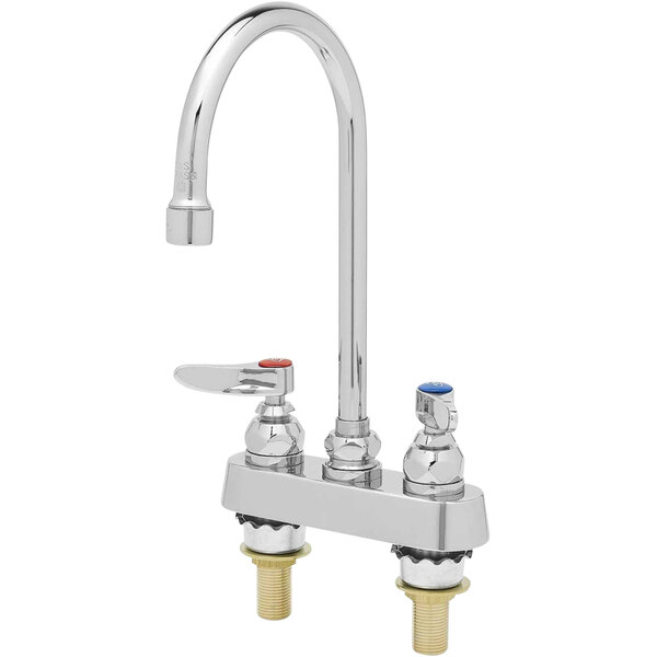 A silver T&S deck-mounted faucet with lever handles.