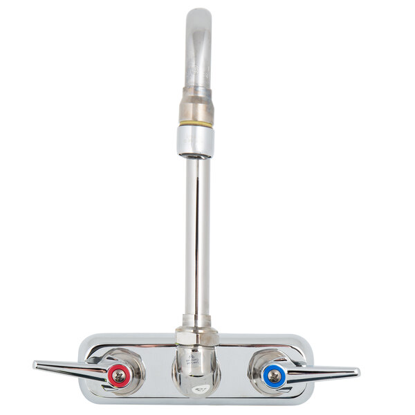 A chrome T&S wall mount faucet with two lever handles.