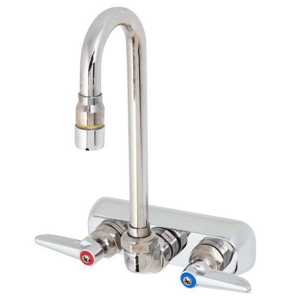 A silver T&S wall mounted faucet with lever handles.
