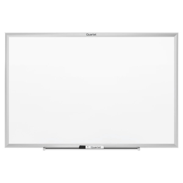 A Quartet melamine whiteboard with a silver frame.