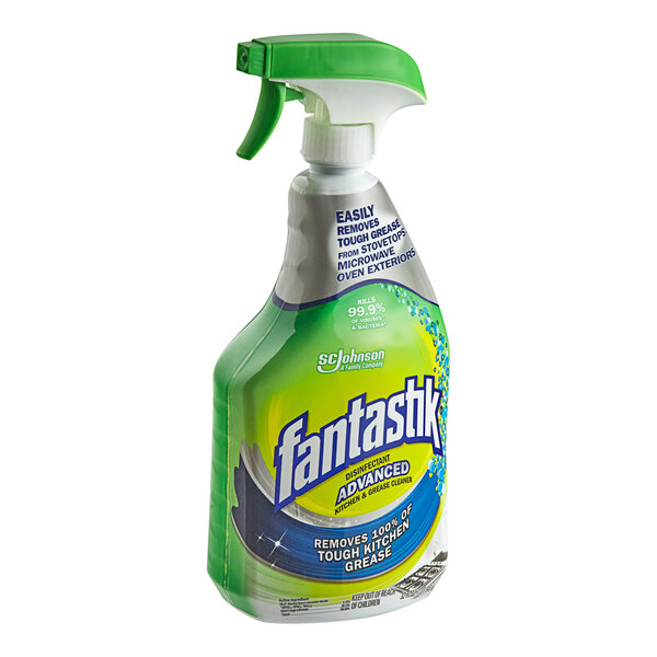A bottle of SC Johnson fantastik Advanced Power Kitchen and Grease Cleaner spray with a green and yellow label.