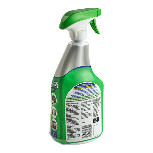 A green and white SC Johnson fantastik spray bottle with a green handle.