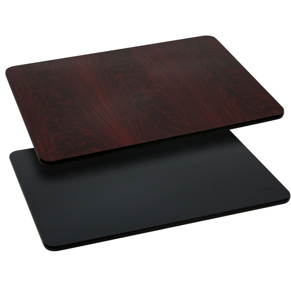 A close-up of a black and brown Flash Furniture rectangular table top.