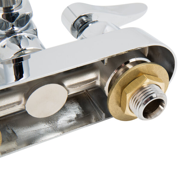 A T&S chrome wall mounted faucet with double-jointed swing spout and lever handles.