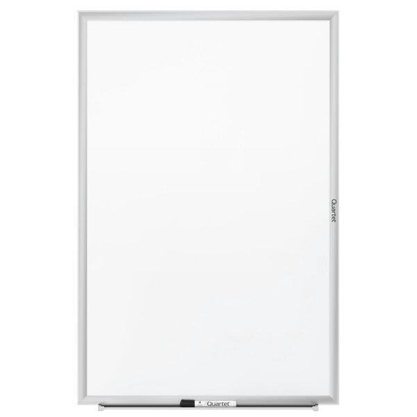 A Quartet whiteboard with a silver aluminum frame.