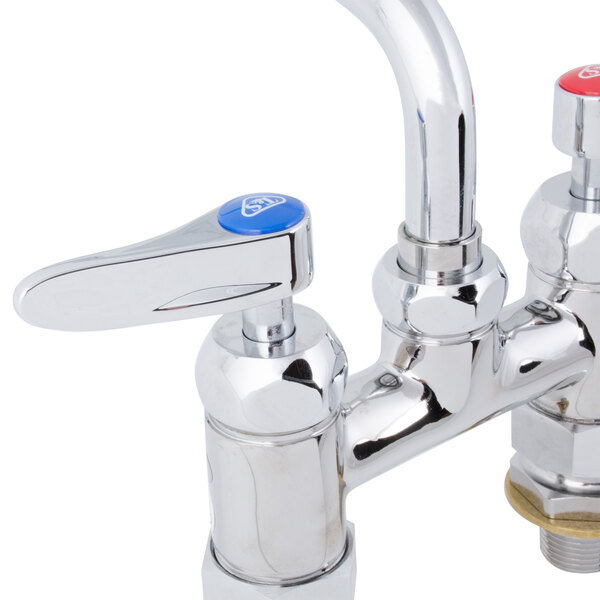 A T&S chrome deck-mounted faucet with lever handles.