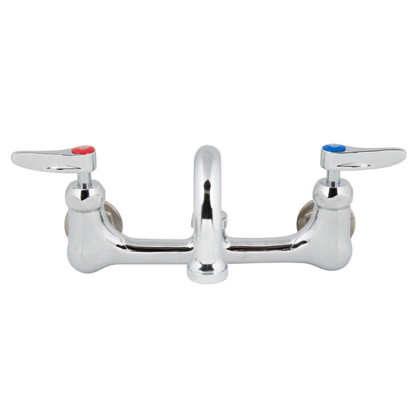 A close-up of a chrome T&S wall mount faucet with lever handles.