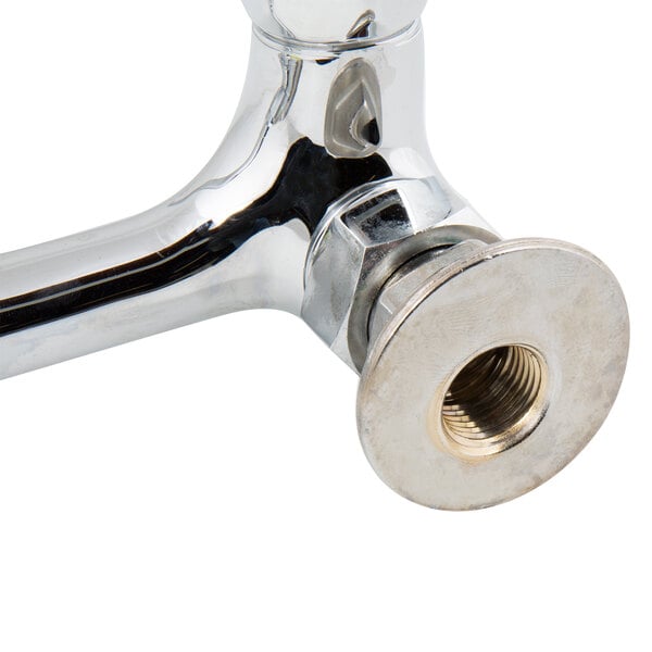 A T&S chrome wall mount faucet with lever handles.