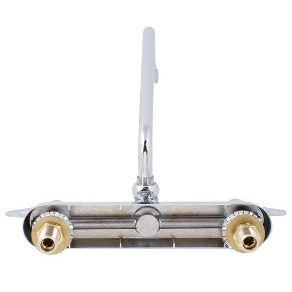 A T&S chrome wall mount faucet with two brass lever handles.