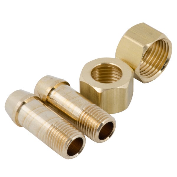 A close-up of several brass T&S fittings.