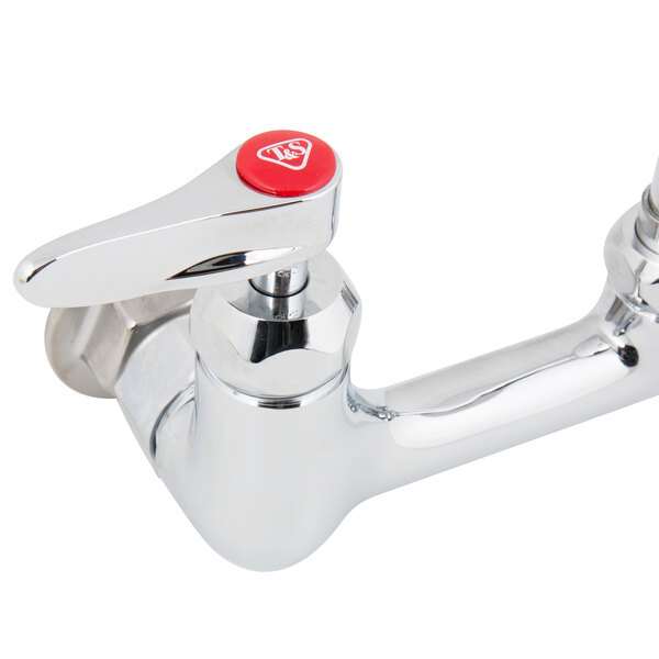 A T&S chrome wall mount faucet with lever handles.