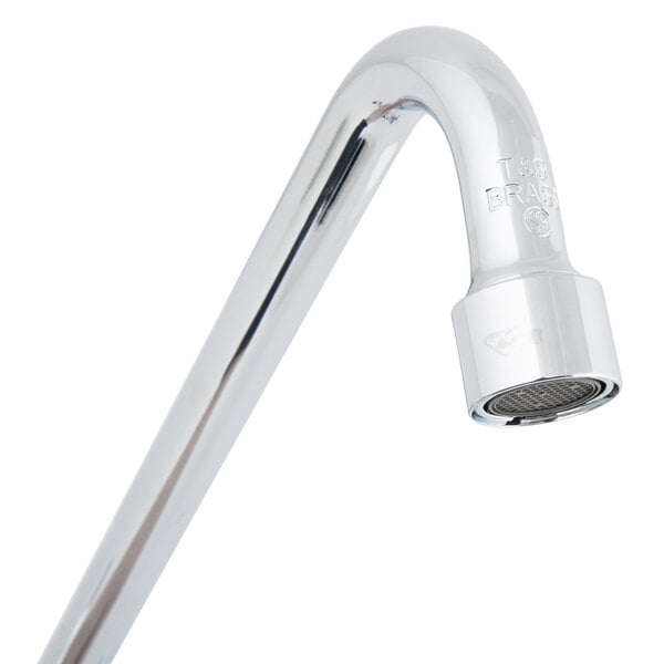 A T&S chrome wall mount faucet with lever handles and a swing spout.