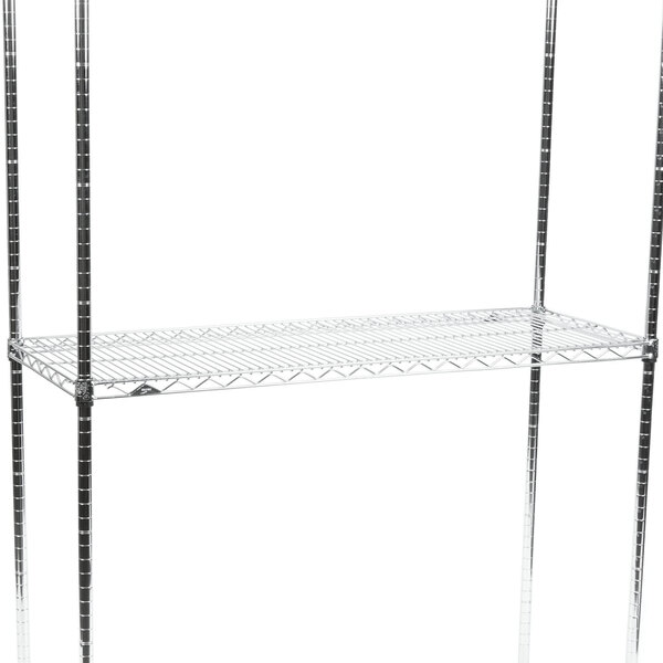 A Metro stainless steel wire shelving unit with two shelves.